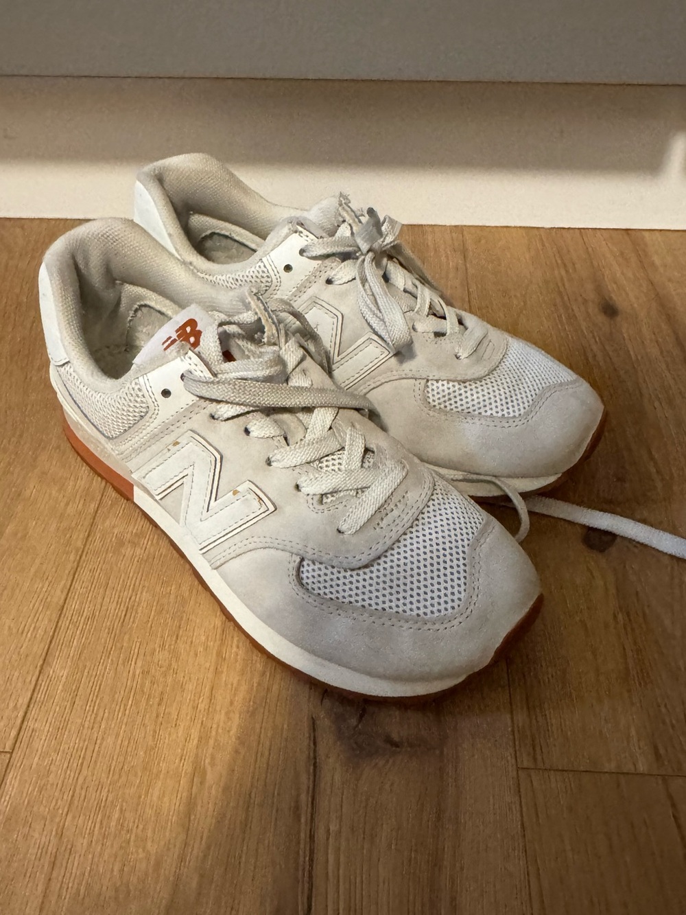 New Balance 574 Women's Cream Lace-Up Sneakers with Orange Accent